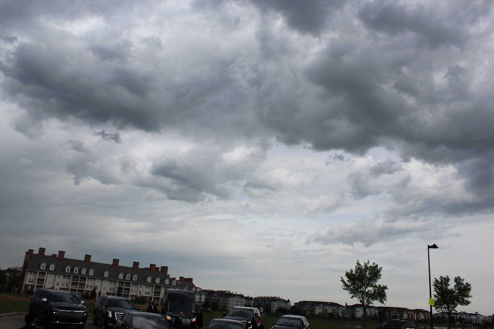 LuxLimo fleet under storm clouds during a flight disruption